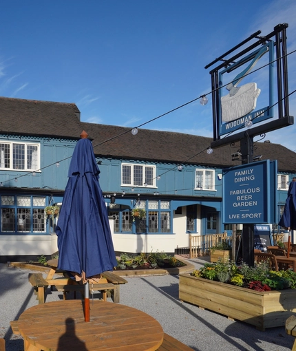 The outside of the Woodman Inn.