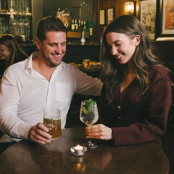 Couples enjoying a valentines meal at a Greene King Heritage vanue.
