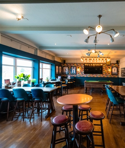 Interior seating area and pool table  of the Cricketers in Southwick