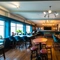 Interior seating area and pool table  of the Cricketers in Southwick