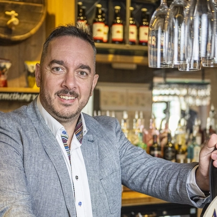 A portrait of a pub manager.