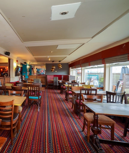 Interior dining area of a pub.