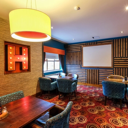 The interior restaurant seating area at The Hardy Pick.