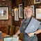 a team member of the Folly pub smiling for the camera