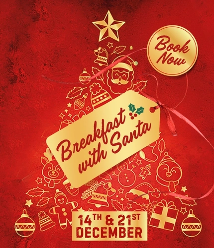A Christmas banner promoting the "Breakfast with Santa" event at the Flaming Grill pubs