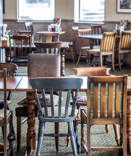 Interior dining area of a pub.
