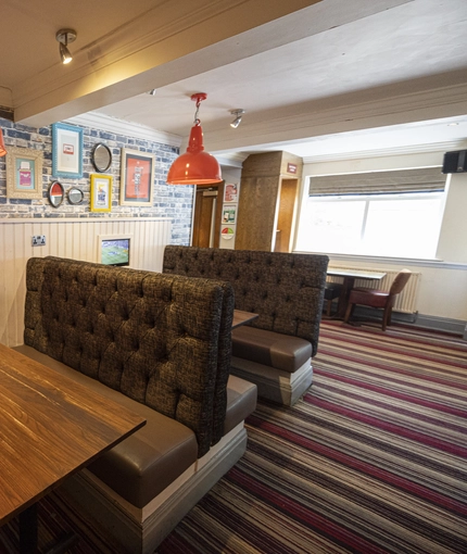 interior of the restaurant with seating area