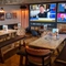 The interior restaurant and seating area with TV at the Man of Gwent.