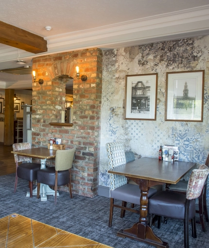 Interior dining area of a pub.