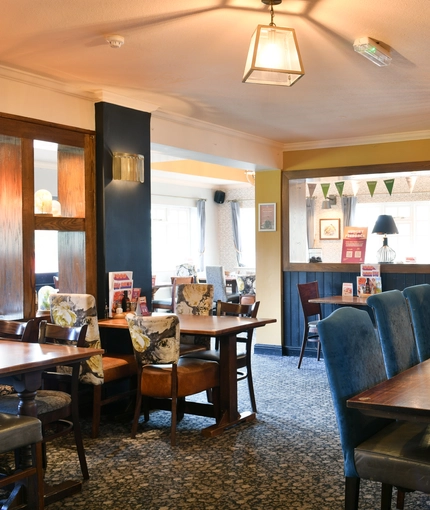 Interior dining area of a pub.