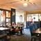 Interior dining area of a pub.