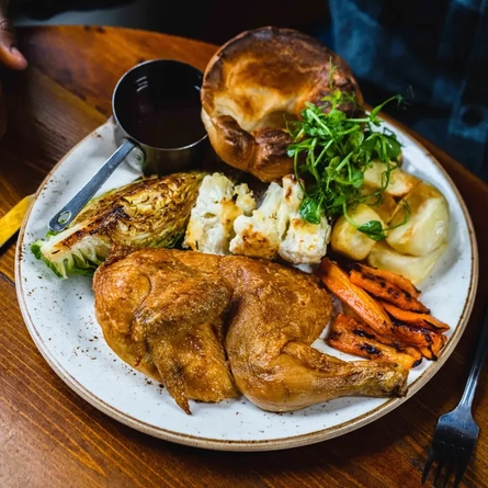 A plate of roast chicken