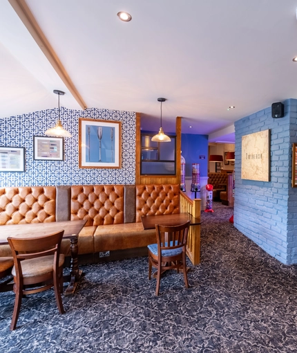 Interior dining area of a pub.