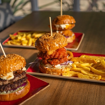 A served selection of burgers  available on the Hungry Horse Autumn Winter menu.