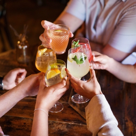An interior shot of people enjoying summer drinks at Urban Core & Heritage venues.