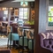 The interior restaurant and seating area with log burner at The Bell.