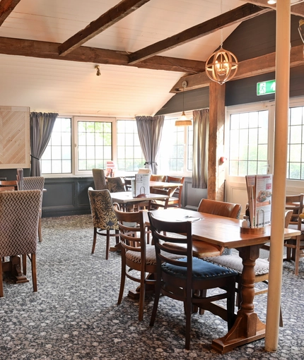 Interior dining area of a pub.