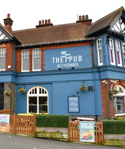 exterior facade and beer garden of the pub