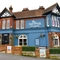 exterior facade and beer garden of the pub