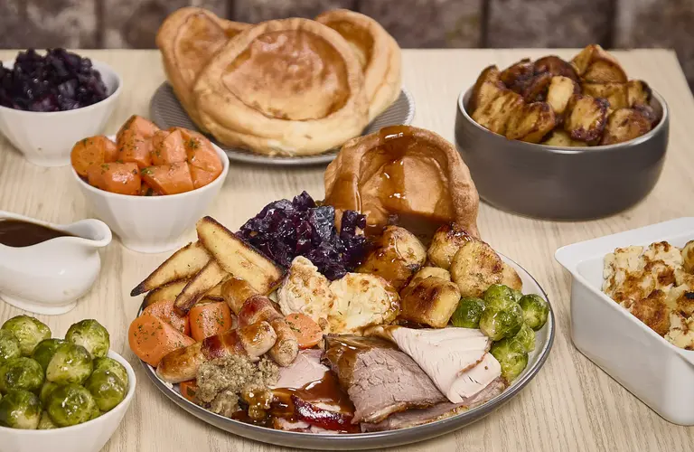 A selection of carvery items on a table with a meal
