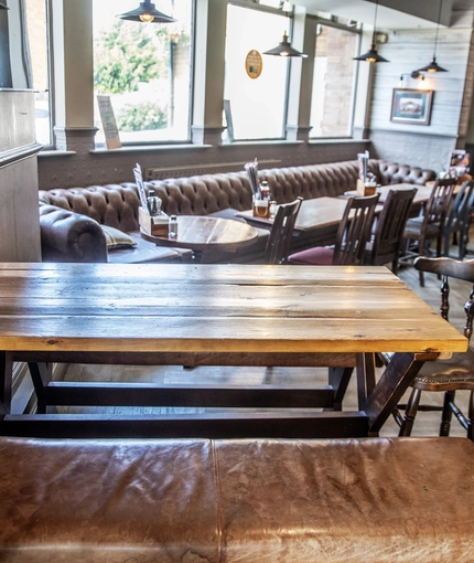 Interior dining area of a pub.