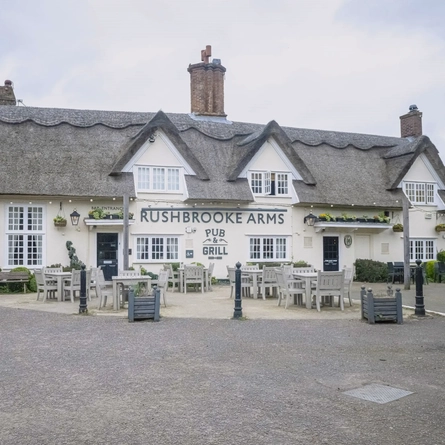 The exterior facade and seating area at The Rushbrooke Arms.