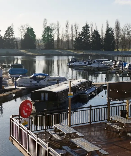 An exterior view from the venue looking out over the canal boats at The Quays.