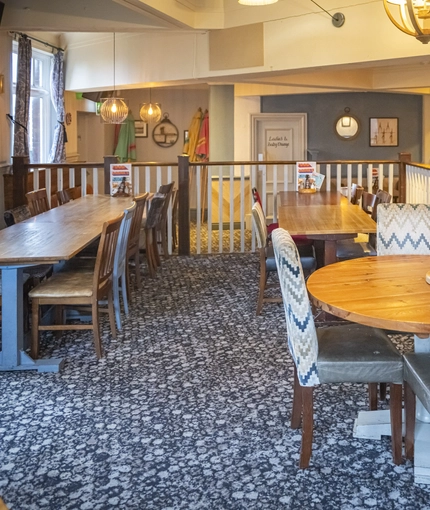 Interior dining area of a pub.
