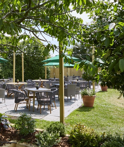The exterior beer garden seating area at The Fox & Hounds in Wimborne.