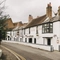 The exterior facade and signage of Ye Olde Swan in Thames Ditton.