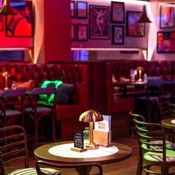 The interior restaurant seating area at The City Of Quebec.