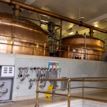 An interior shot of the equipment used at a Greene King Brewery.