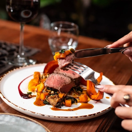 An image of someone enjoying a main meal in the restaurant at the Ubiquitous Chip in Glasgow.