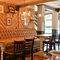 Interior dining area of a pub.