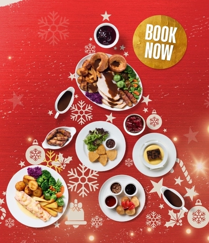 A banner promoting Christmas for Flaming Grill venues.