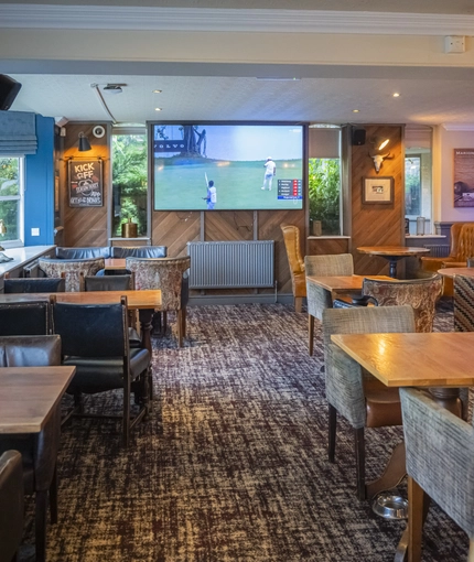 interior of the restaurant and seating area with pub games