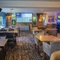 interior of the restaurant and seating area with pub games