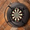 A close up image of a dartboard within the interior of The Old Red Lion.