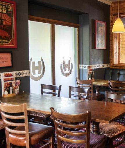 Interior dining area of a pub.