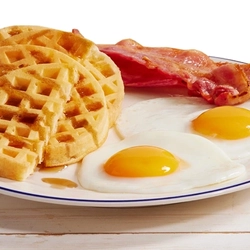Waffle breakfast served on a table