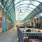 Exterior of the venue Punch & Judy with surrounding venues