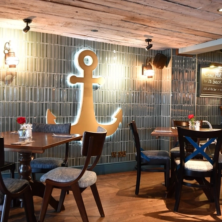 Interior dining area of a pub.
