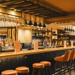 The interior bar with bar stool and bar chair seating at The Foundry Bell.