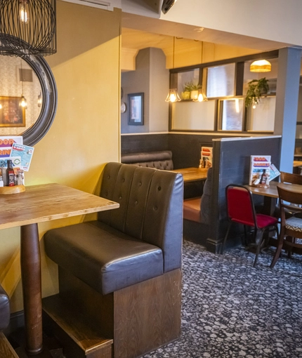 Interior dining area of a pub.