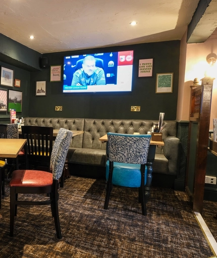 An interior shot of the restaurant & TV at the Sitwell Arms in Whiston.