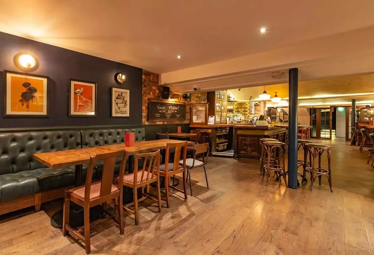 Metro - New Moon (Whitechapel) - The seating area of The New Moon