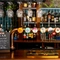 A close up view of a golden drinks tray and the beer taps for Hazy Day, Level Head, Old Mout Berries & Cherries, Inch's, San Miguel, and Birra Moretti; on the bar at The Talbot in Worcester.