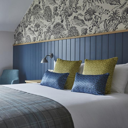 An interior image of one of the hotel rooms at The Bear Hotel.