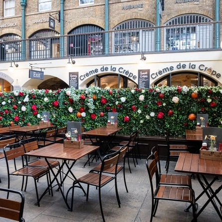 The exterior beer garden seating area of The Punch and Judy in Covent Garden.