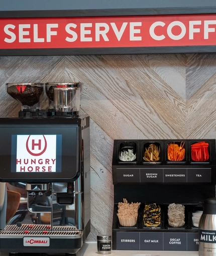 A close up view of the self-serve coffee machine at the Cuckoo Oak in Madeley.